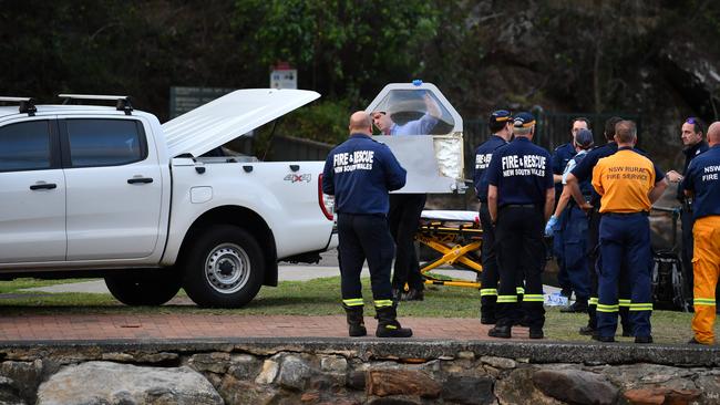 Police recover debris from the wreckage. Picture: AAP Image/Perry Duffin