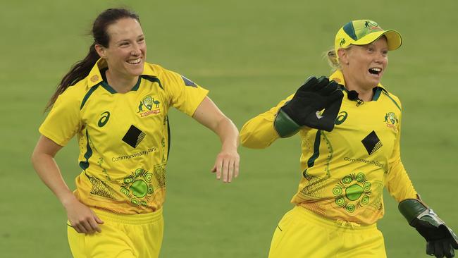 Megan Schutt (left) took two wickets on her return to the national side.