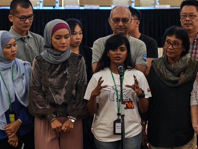 Grace Subathirai Nathan, daughter of  Malaysia Airlines flight MH370 passenger Anne Daisy, speaks during a press conference after being presented with the final investigation report.