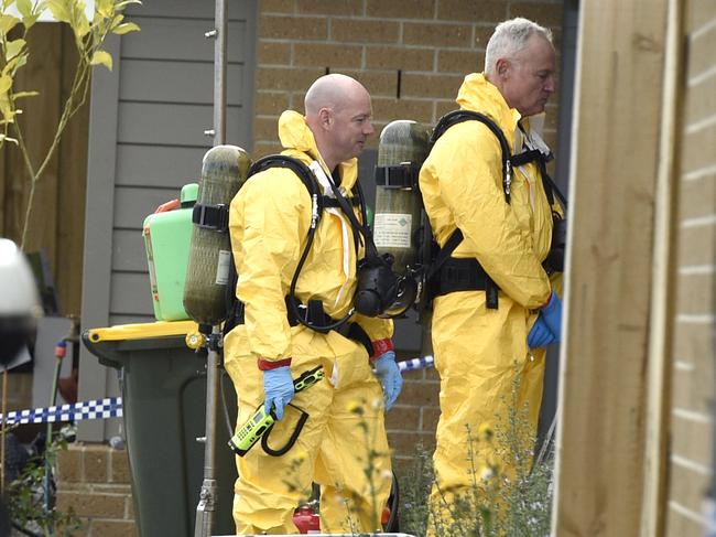 Forensics teams at the home on Bicknell Court in Broadmeadows. Picture: Andrew Henshaw