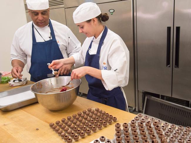 Chocolate truffles for 800 please, chef! Picture: AFP PHOTO / POOL / David Parker