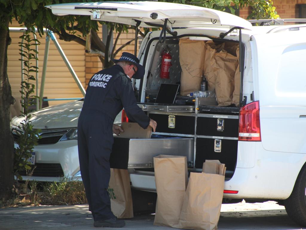 Forensic officers were seen outside the property for much of Monday. Picture: NCA NewsWire / Anthony Anderson