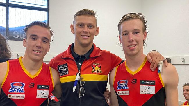 Dingley senior coach Danny Ades with his newcomers Adam Peacock (left) and Lachie Benton.