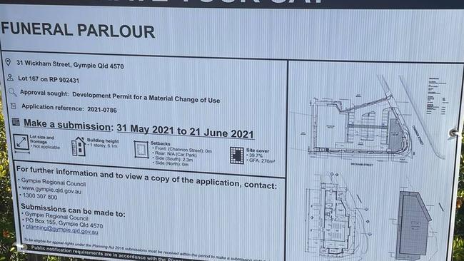 A sign showing details of the proposal funeral parlour to be built on the site of the old Brodies in Channon St.