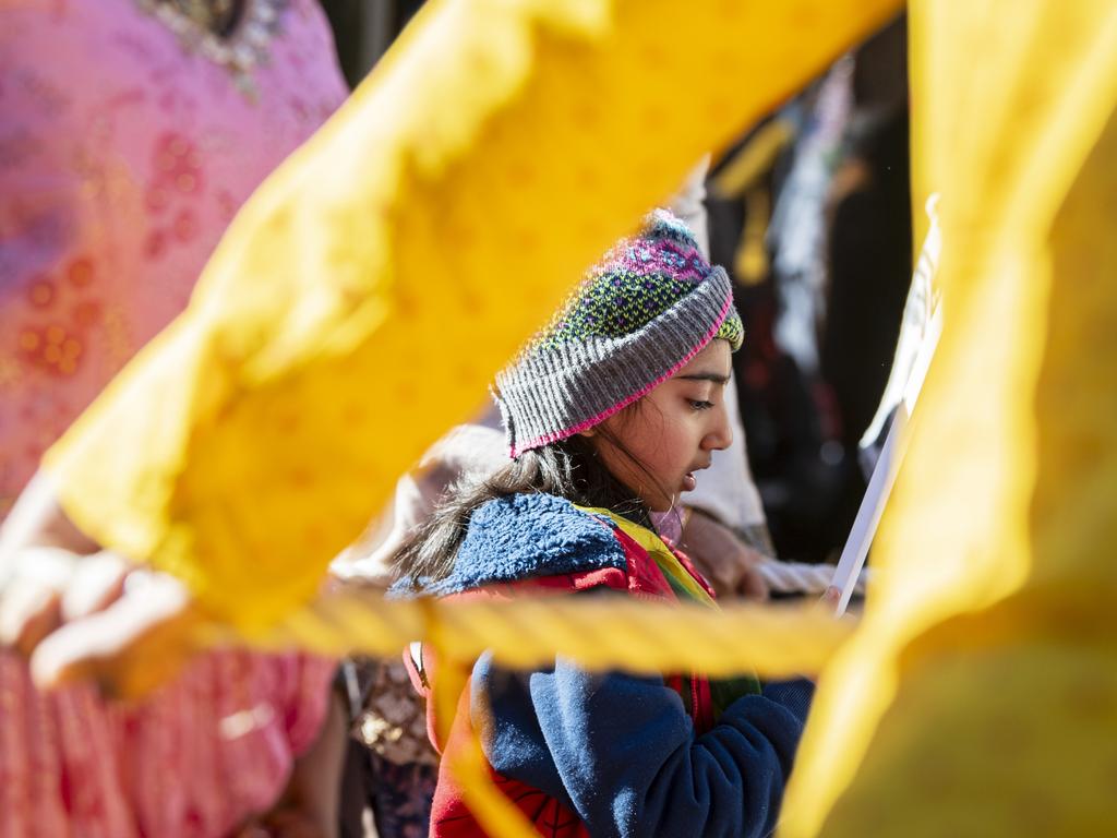 Antra Chaudhari walks between the chariot ropes as it is pulled along Neil St in Toowoomba's Festival of Chariots, Saturday, July 20, 2024. Picture: Kevin Farmer