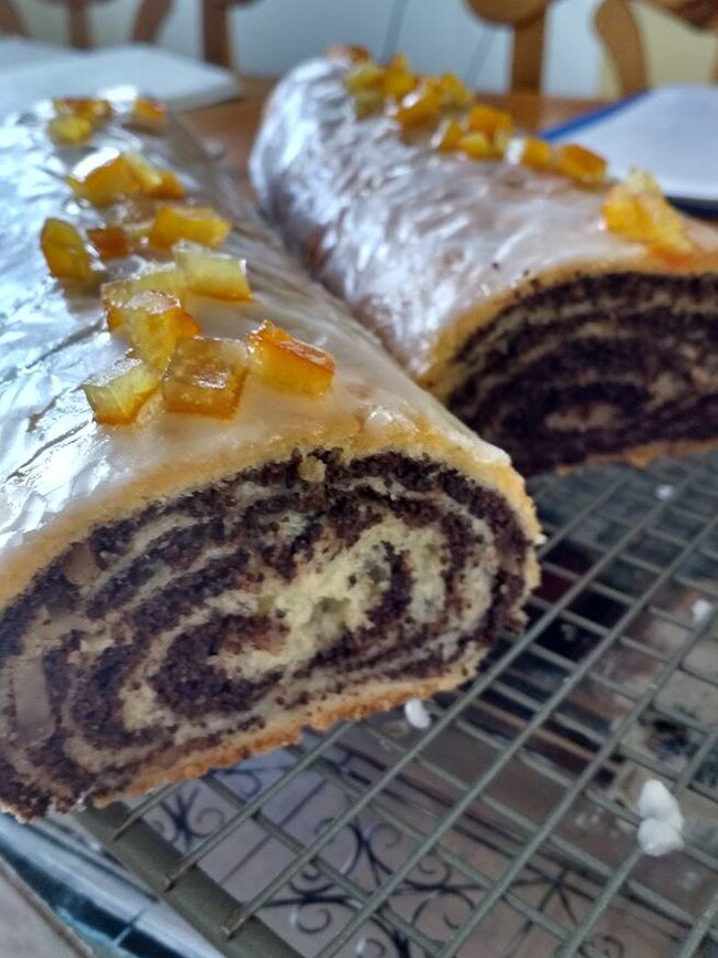 MS Grkow uniquely stuffs her poppy seed strudel with almonds, honey and raisins along with poppy seed cream.