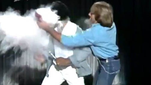 Kamahl was hit in the face with white powder while performing live on the show to promote his album. Picture: Twitter.