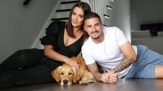 Jamie Maclaren with fiance Iva Arapovic and their dog Simba. Picture: Andrew Tauber