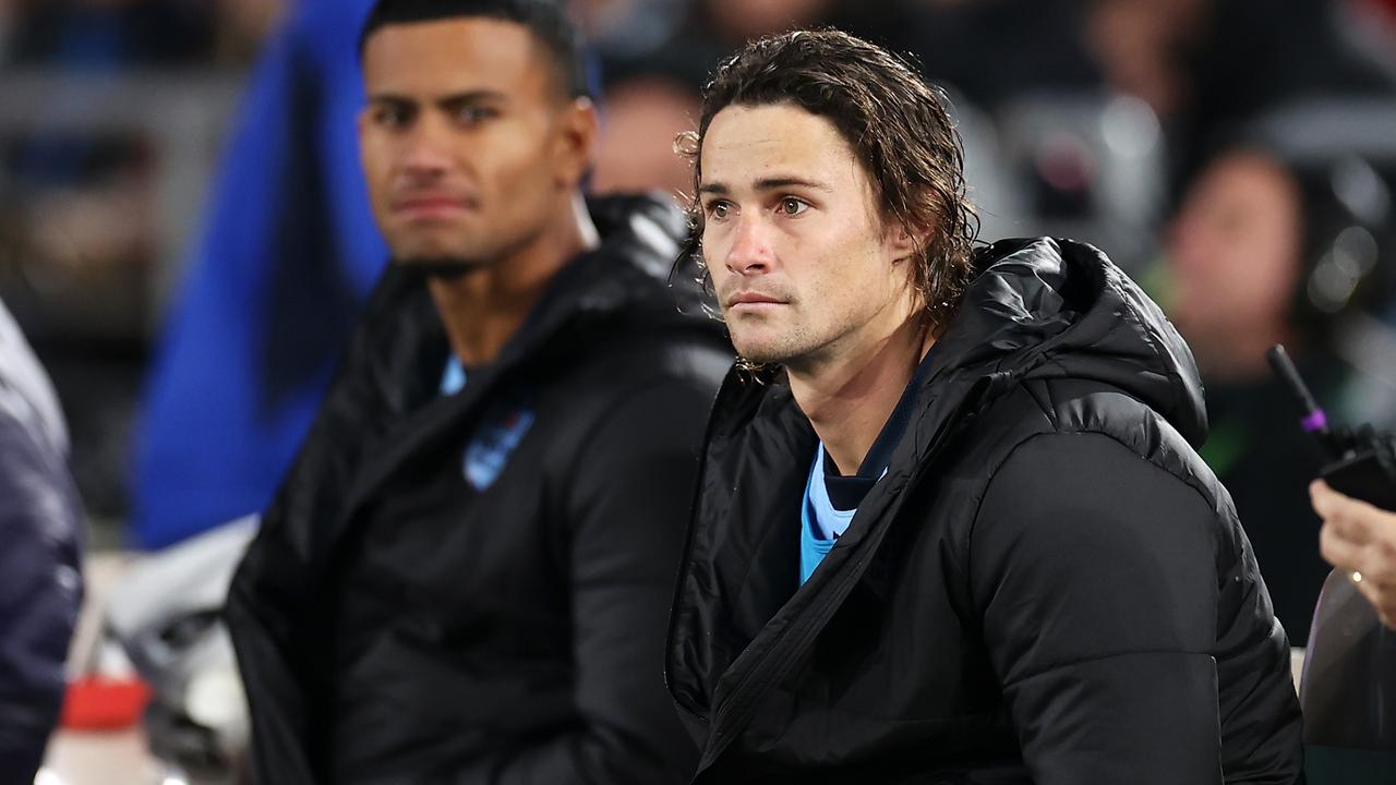SYDNEY, AUSTRALIA - JUNE 08: Nicho Hynes of the Blues watches on from the sideline during game one of the 2022 State of Origin series between the New South Wales Blues and the Queensland Maroons at Accor Stadium on June 08, 2022, in Sydney, Australia. (Photo by Mark Kolbe/Getty Images)