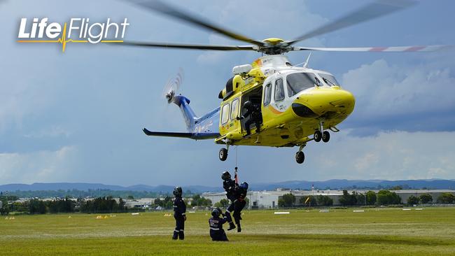 Doctors undergoing helicopter winch training.