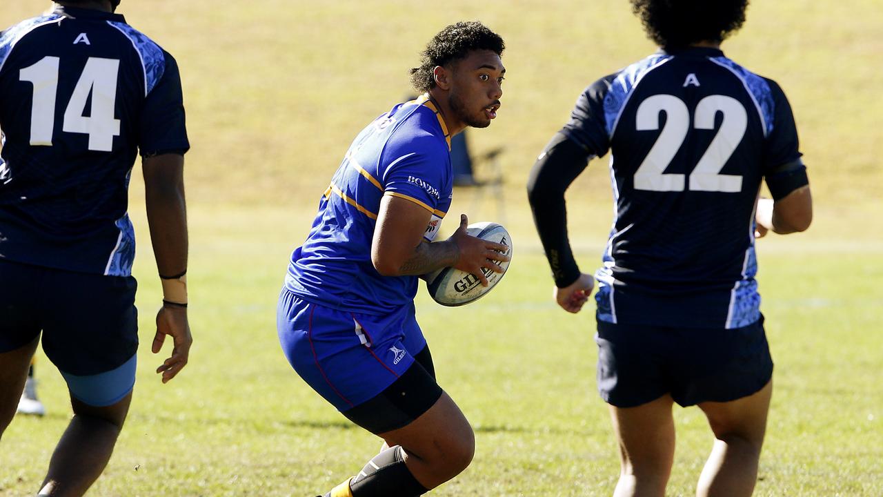 Sydney Junior's Quade Leo with the ball. CCC (two tone blue) v Sydney Juniors (blue and gold) U18 NSW Boys Rugby Schools Selection trials. Picture: John Appleyard