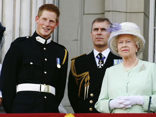 Prince Harry wearing his Sandhurst army uniform, Prince Andrew the Duke of York and HM Queen Elizabeth ll. Picture: Getty Images