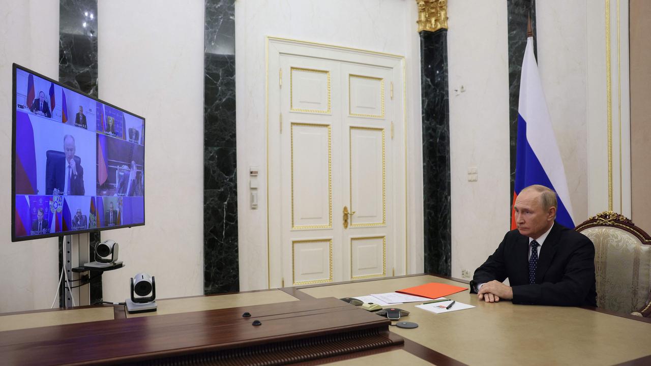 Russian President Vladimir Putin chairs a Security Council meeting via a video link in Moscow. Picture: AFP