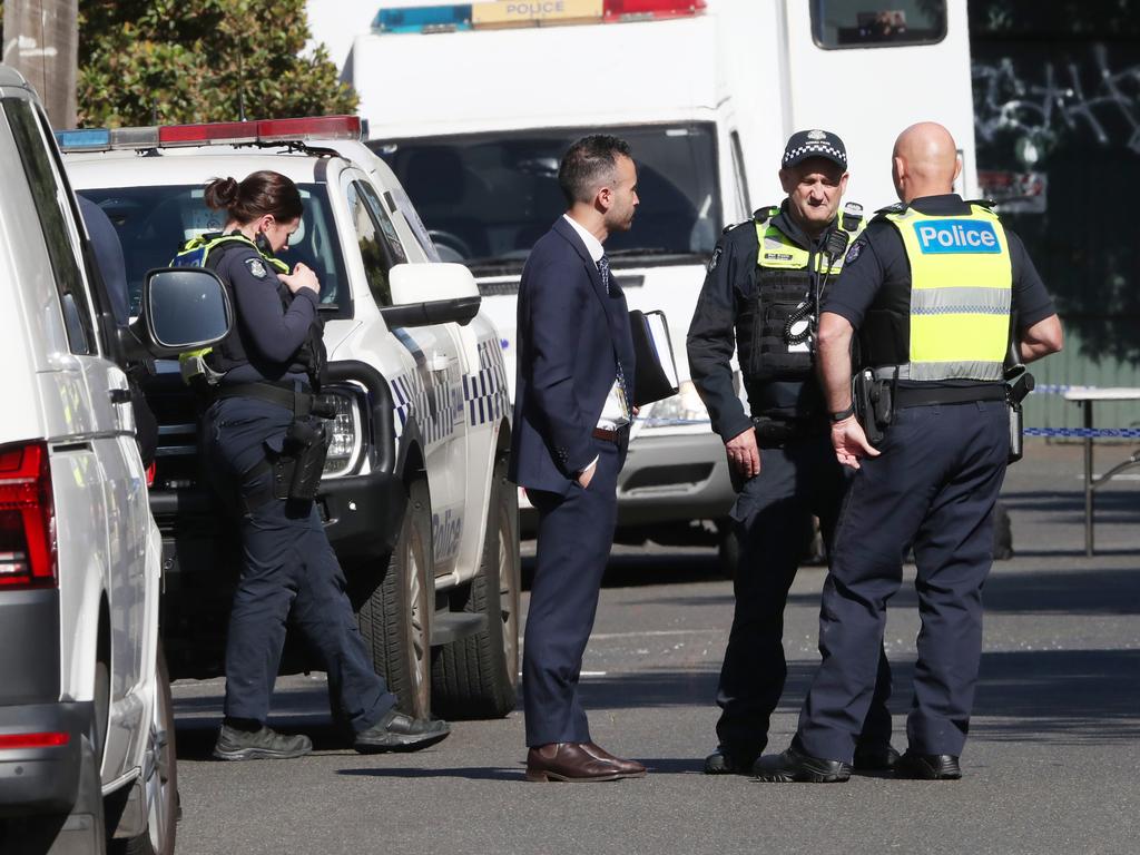 Investigators in Langford St on Saturday morning. Picture: NewsWire/ David Crosling