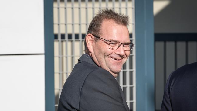 Former Tasmanian Liberal MP Adam Brooks arrives at Redcliffe Magistrates to face charges by Queensland police for being in possession of a handgun, unauthorised explosives and false driver's licences. Picture: Brad Fleet