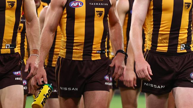 James Sicily and his Hawks team mates look dejected after losing the round seven AFL match between Hawthorn Hawks and Sydney Swans at Melbourne Cricket Ground, on April 28, 2024, in Melbourne, Australia. (Photo by Quinn Rooney/Getty Images)