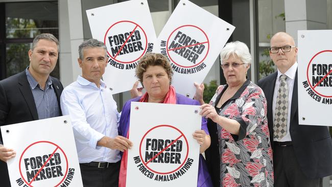 Five inner west Councils are united in their fight against forced amalgamations and have banded together to ensure their communities understand the full impact of the State GovernmentÕs proposed ÒFit for the FutureÓ program. (L-R) Burwood Mayor John Faker, Canada Bay Mayor Angelo Tsirekas, Leichhardt Mayor Rochelle Porteous, Ashfield Mayor Lucille McKenna and Marrickville Mayor Mark Gardiner.