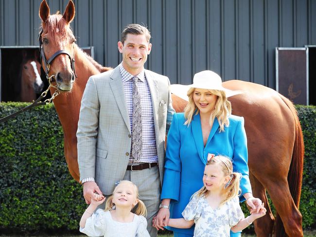 Tom and Emma Hawkins prepare for the Melbourne Cup Carnival, with daughters Primrose and Arabella, and former Cup winner Vow and Declare. Picture Rebecca Michael.