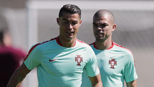 Portugal's Cristiano Ronaldo, left, and Pepe.