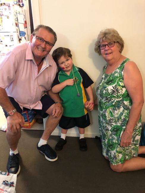 Lyall and Lynne Walker with their grandson Slater Clifton-Walker.