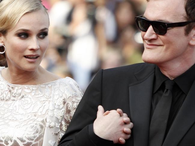 20/05/2009 WIRE: Director Quentin Tarantino and actor Diane Kruger arrive on the red carpet for the film 'Inglourious Basterds', during the 62nd International film festival in Cannes, southern France, 20/05/2009.