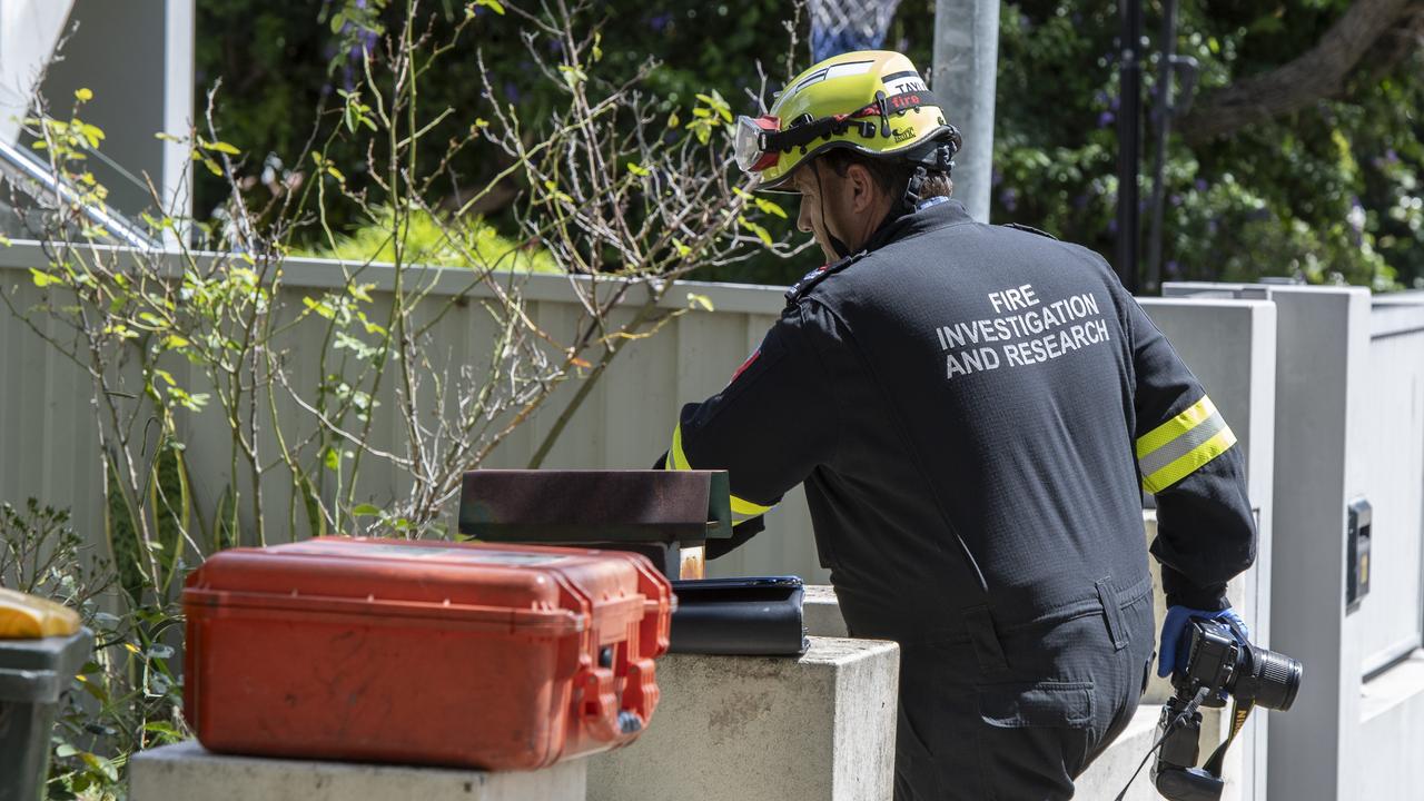 An investigator enters the home in Dora St, Hurstville. Picture: NewsWire / Monique Harmer