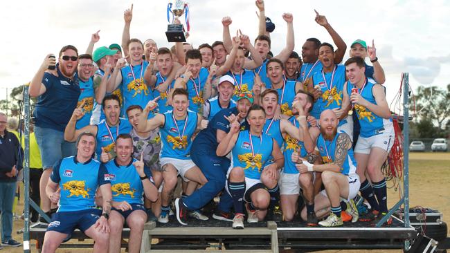 Cerberus celebrates its premiership in Division 4. Picture: Everard Fenton.