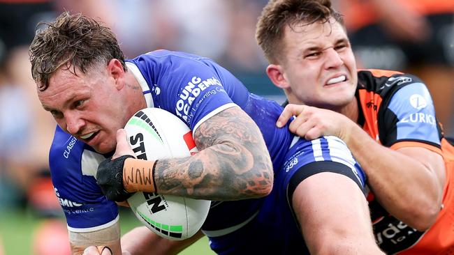 SYDNEY, AUSTRALIA - MAY 04: Kurt Mann of the Bulldogs scores a try during the round nine NRL match between Canterbury Bulldogs and Wests Tigers at Accor Stadium, on May 04, 2024, in Sydney, Australia. (Photo by Brendon Thorne/Getty Images)