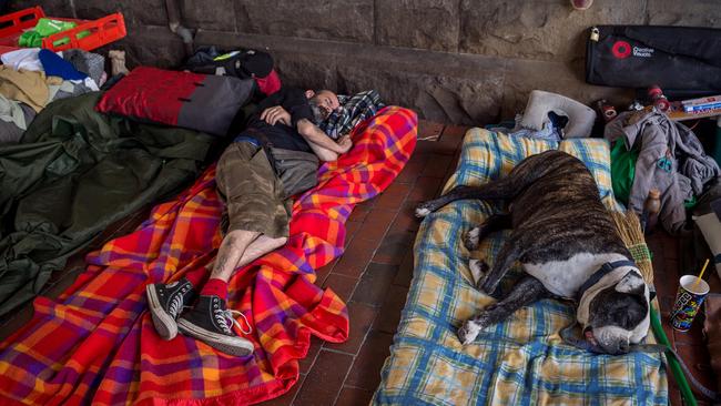 Homeless people in the Melbourne CBD have set up camp under the railway bridge on the cnr of Flinders and William Streets. Picture: Jake Nowakowski