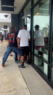 Passersby locals trap alleged looters in shop