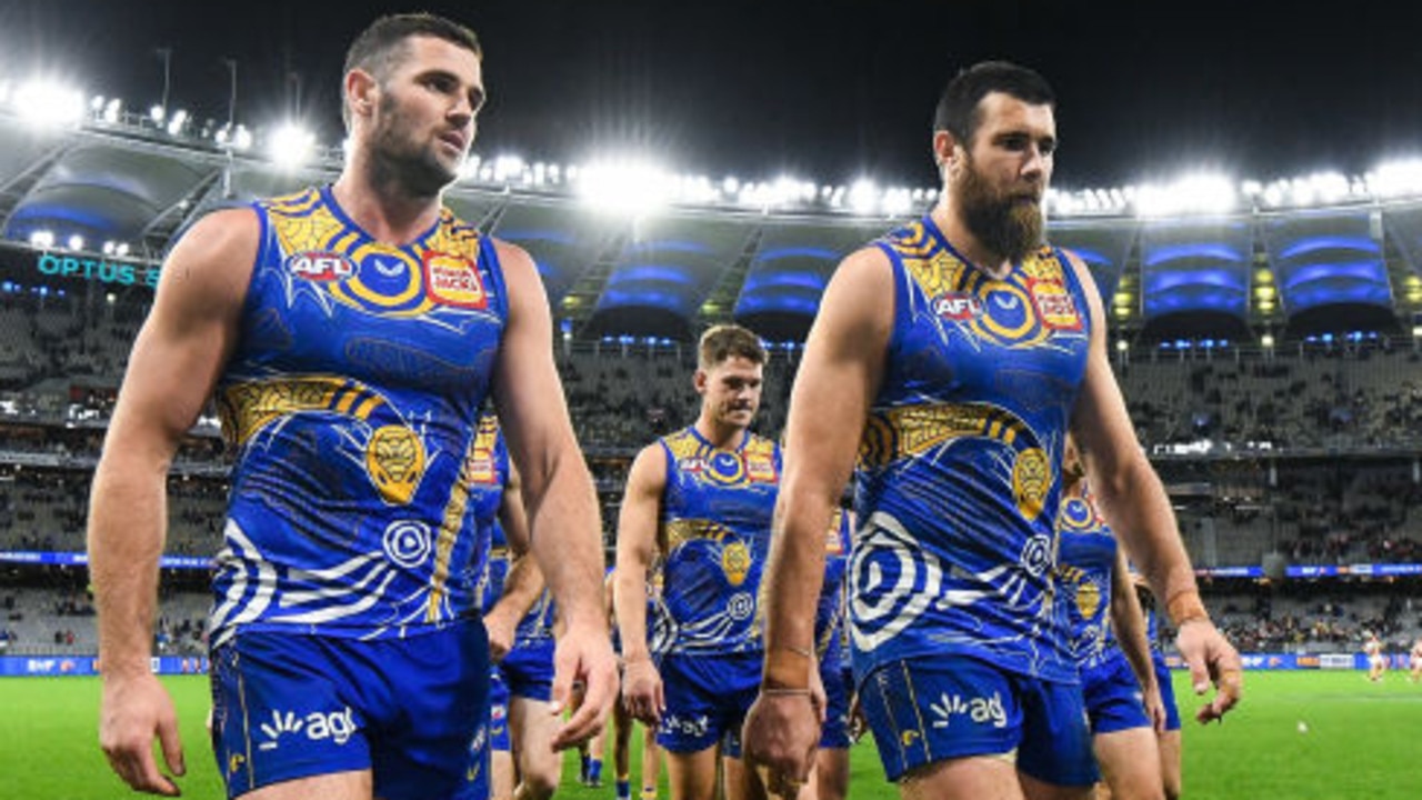 PERTH, AUSTRALIA - MAY 29: Jack Darling and Josh J. Kennedy of the Eagles lead the team into the rooms after the loss during the 2021 AFL Round 11 match between the West Coast Eagles and the Essendon Bombers at Optus Stadium on May 29, 2021 in Perth, Australia. (Photo by Daniel Carson/AFL Photos via Getty Images)