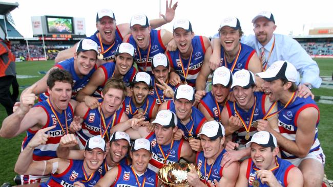 Ian Callinan, bottom right, played in four of Roy Laird’s seven SANFL premierships, including Central District’s 2009 victory against Sturt.