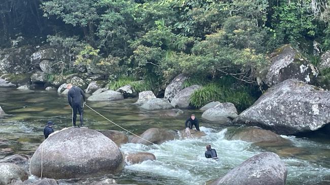 Police divers search for human remains in Mossman Gorge after a human bone was found on August 22. Picture: Supplied.