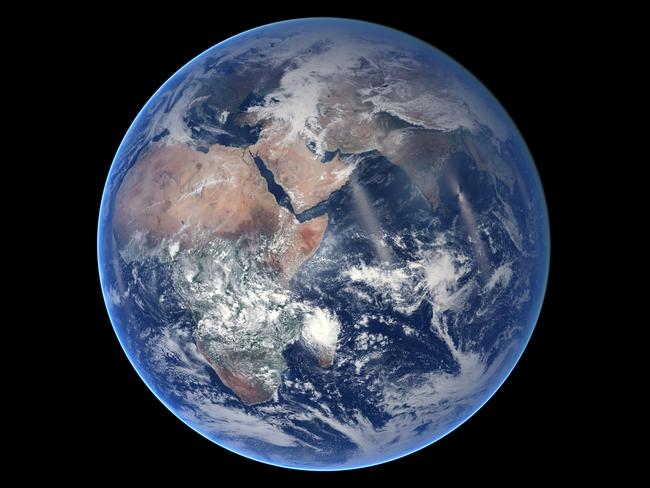 (FILES)  This file NASA Earth Observatory photo released August 21, 2014 and acquired March 30, 2014 shows an image of Earth - Blue Marble from the time-lapse video of the VIIRS composite for the eastern hemisphere from January 18 to July 25, 2014. - Water covers 70 percent of the Earth's surface and is crucial to life as we know it, but how it got here has been a longstanding scientific debate. The puzzle was a step closer to resolution on August 27, 2020 after a team of French scientists reported in the journal Science they had identified which space rocks may have been responsible.Cosmochemist Laurette Piani, who led the research, told AFP that, contrary to prevailing theories, Earth's water may have already been contained in its building blocks. (Photo by HANDOUT / NASA / AFP) / RESTRICTED TO EDITORIAL USE - MANDATORY CREDIT "AFP PHOTO /NASA/HANDOUT " - NO MARKETING - NO ADVERTISING CAMPAIGNS - DISTRIBUTED AS A SERVICE TO CLIENTS / TO GO WITH AFP STORY BY ISSAM AHMED - "Blue planet: Study proposes new origin theory for Earth's water"