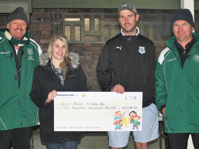 Quakers Hill JSC raised mover $6,500 to help the family of Bailey Rogers cope with the medical costs. From left: Mino Pellizzon, Ashlee and Dean Rogers, (Bailey’s parents) and Brent Chidgey