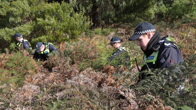 Police searched bushland in Cranbourne on Tuesday. Picture: David Crosling