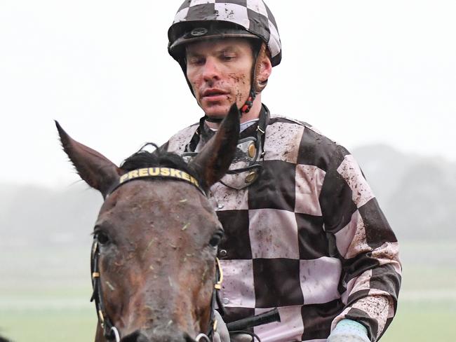 Ben Melham returns to scale after riding Orleans Rock to victory at Sandown.