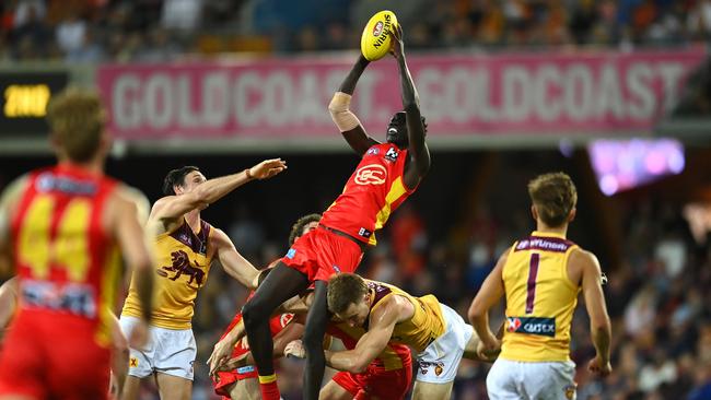 Mac Andrew soars. Picture: Albert Perez/AFL Photos via Getty Images.