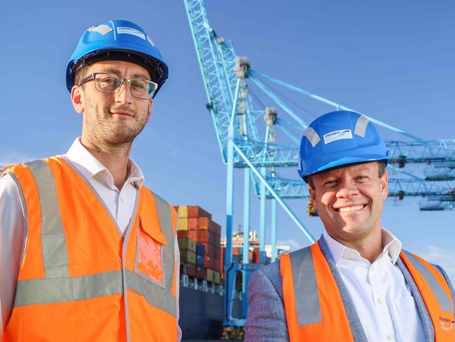 ADV NEWS Matt Michalewicz, Complexica managing director and Flinders Port CFO Keith Halifax (glasses)has struck a deal to use AI to help run the ports with Cranes etc at outer Harbor Container Terminal Image/Russell Millard