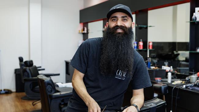 Business owner Shier Esk at the Hangout Barber Club in Murrumba Downs. Picture Lachie Millard