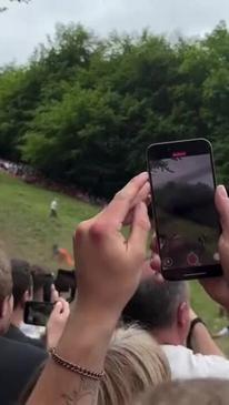 Daredevil Racers Barrel Downhill in Wild English Cheese-Rolling Chase