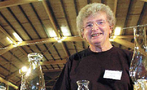 Glass gems: Stallholder Max Hardman with some of his beautifulglassware on sale at the Alstonville Rotary Antiques and Collectables Fair on Saturday. . Picture: Cathy Adams