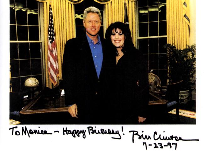 Then-President Bill Clinton with former White House intern Monica Lewinsky in the Oval office in a photograph given by the President to her as a birthday gift in 1997.