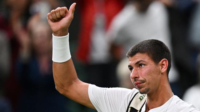 Australia's Alexei Popyrin salutes the crowd as he leaves Centre Court after loosing against Serbia's Novak Djokovic. Picture: AFP