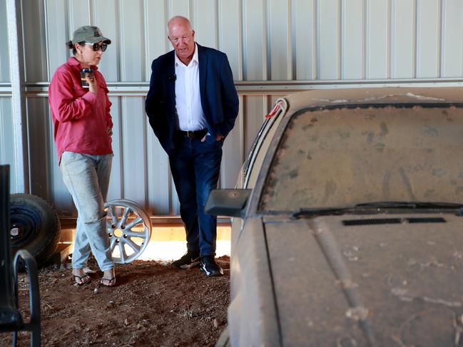 Damian Loone and Rachelle Childs’ sister Kristy talk about the case while looking at Rachelle's Commodore in regional NSW. Picture: Jeff Darmanin