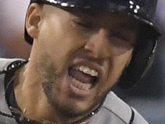 Houston Astros' George Springer celebrates after a home run against the Los Angeles Dodgers during the 11th inning of Game 2 of baseball's World Series Wednesday, Oct. 25, 2017, in Los Angeles. (AP Photo/Mark J. Terrill)