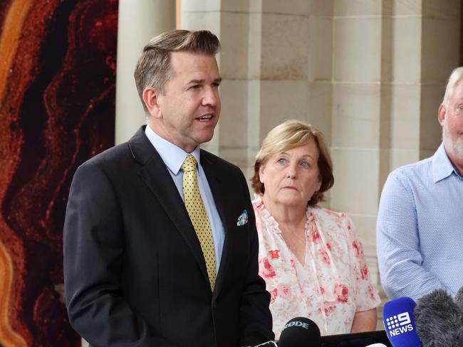 Deputy Premier Jarrod Bleijie with Bruce and Denise Morcombe during a media conference at Parliament House, Brisbane. Picture: Liam Kidston