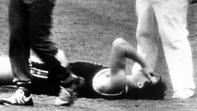 Frawley lies stunned after being hit behind the play in 1988.