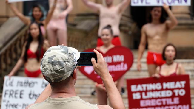 Onlookers snapped photos of the “cheeky” demonstration. Picture: NCA NewsWire/ Nicholas Eagar