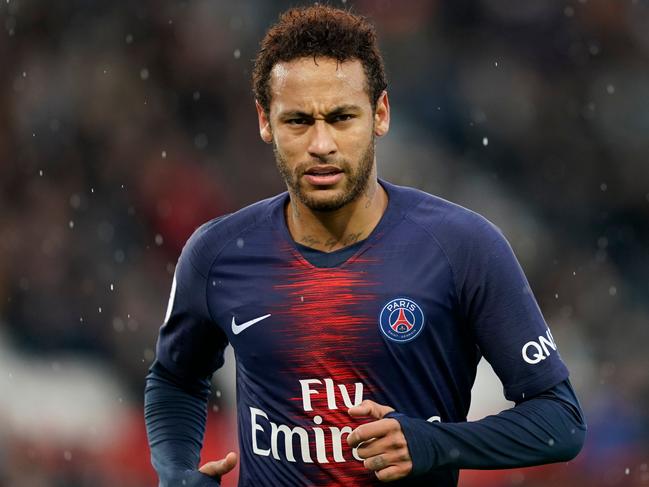 (FILES) In this file photo taken on May 4, 2019 Paris Saint-Germain's Brazilian forward Neymar looks on during the French L1 football match between Paris Saint-Germain (PSG) and OGC Nice at the Parc des Princes stadium in Paris. - Neymar failed to show up for pre-season training with Paris Saint-Germain on July 8, 2019 with the club announcing they would take "appropriate action". Paris Saint-Germain president Nasser Al-Khelaifi has warned Neymar and his other highly-paid stars that they must shape-up or ship out, claiming "celebrity behaviour" at the French champions will not be tolerated. (Photo by Lionel BONAVENTURE / AFP)